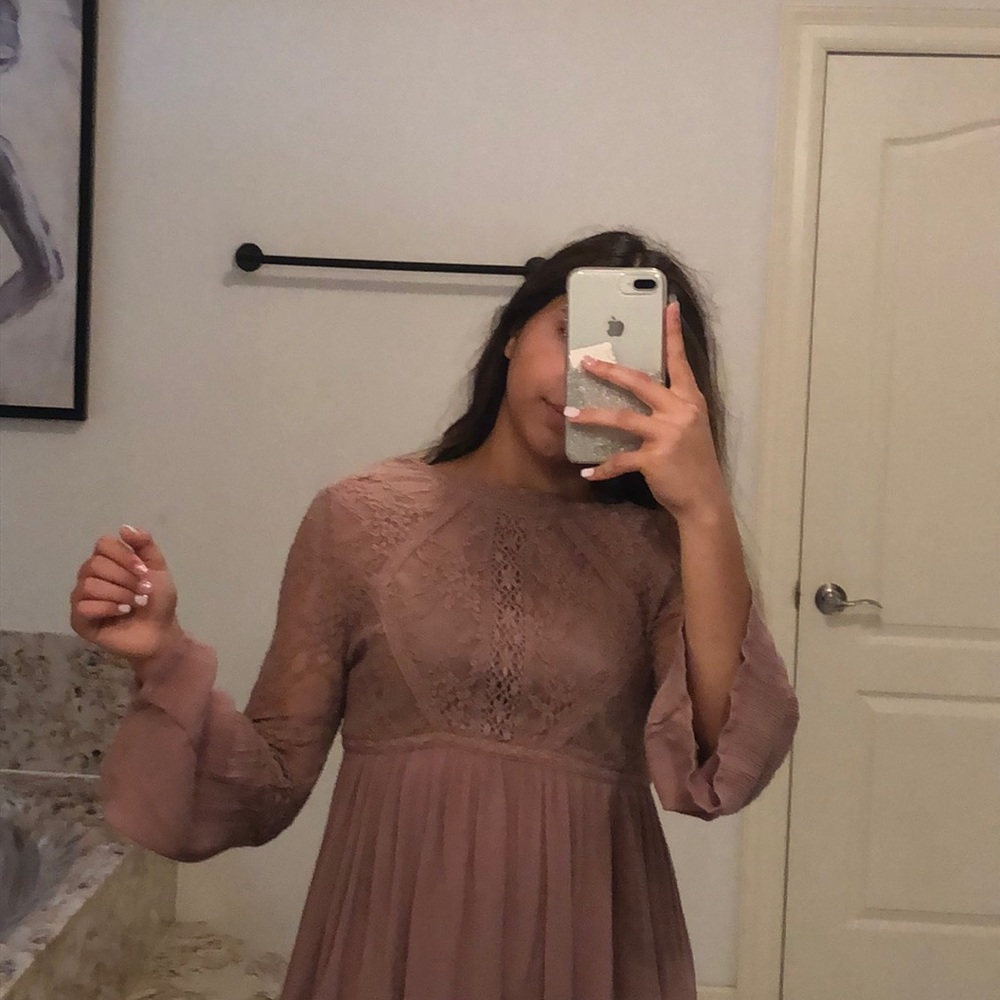 Pink long sleeved blouse